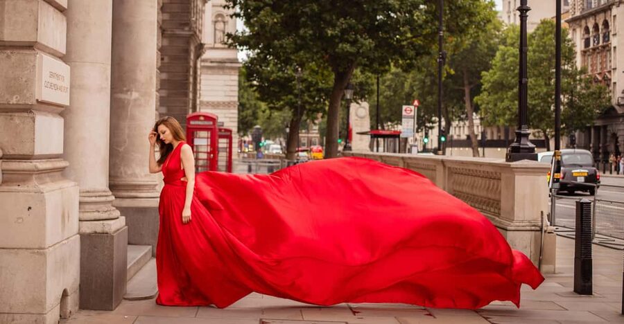 Flying dress professional photoshoot with pro photographer - A red gown against Big Ben