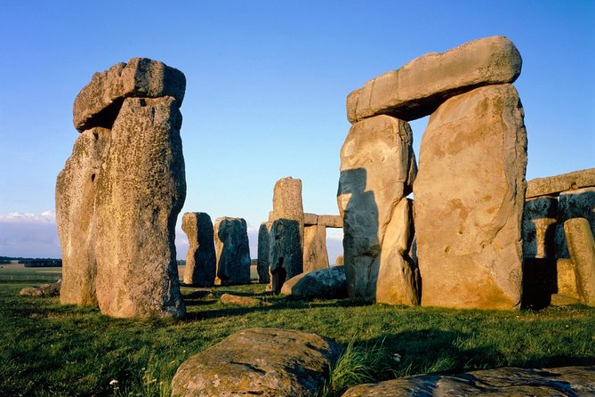 Stonehenge, Windsor Castle, and Bath from London - Stonehenge: ancient stones, modern questions